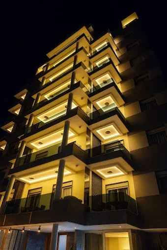The building lit up at night