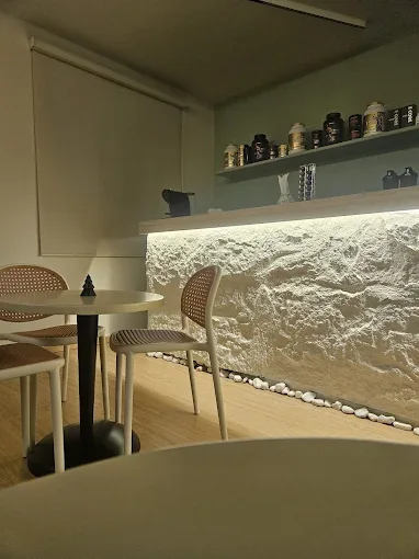 Café corner with a stone-textured bar